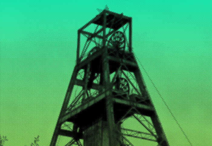 Ein Förderturm in einem gelb-grünen Filter